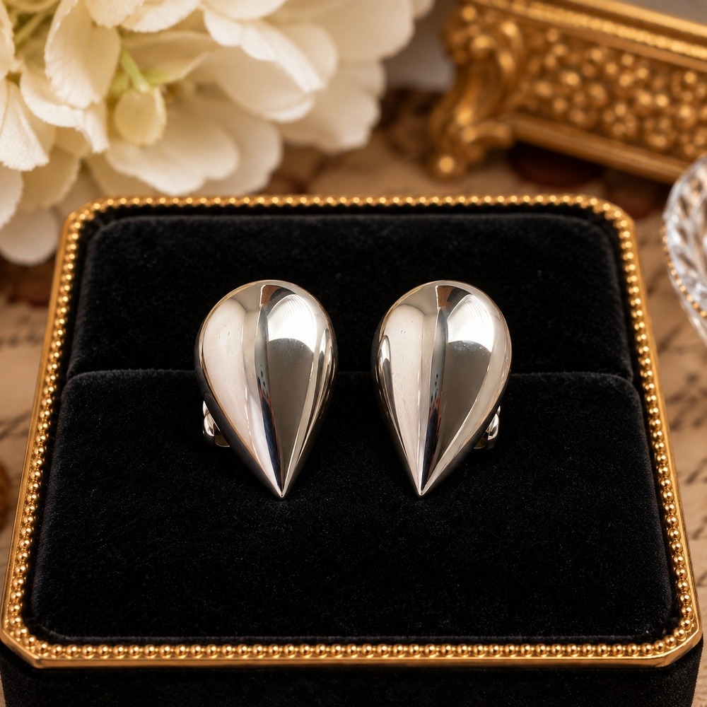 Vintage Coro Silver Tone Polished Teardrop Clip On Earrings Signed MCM